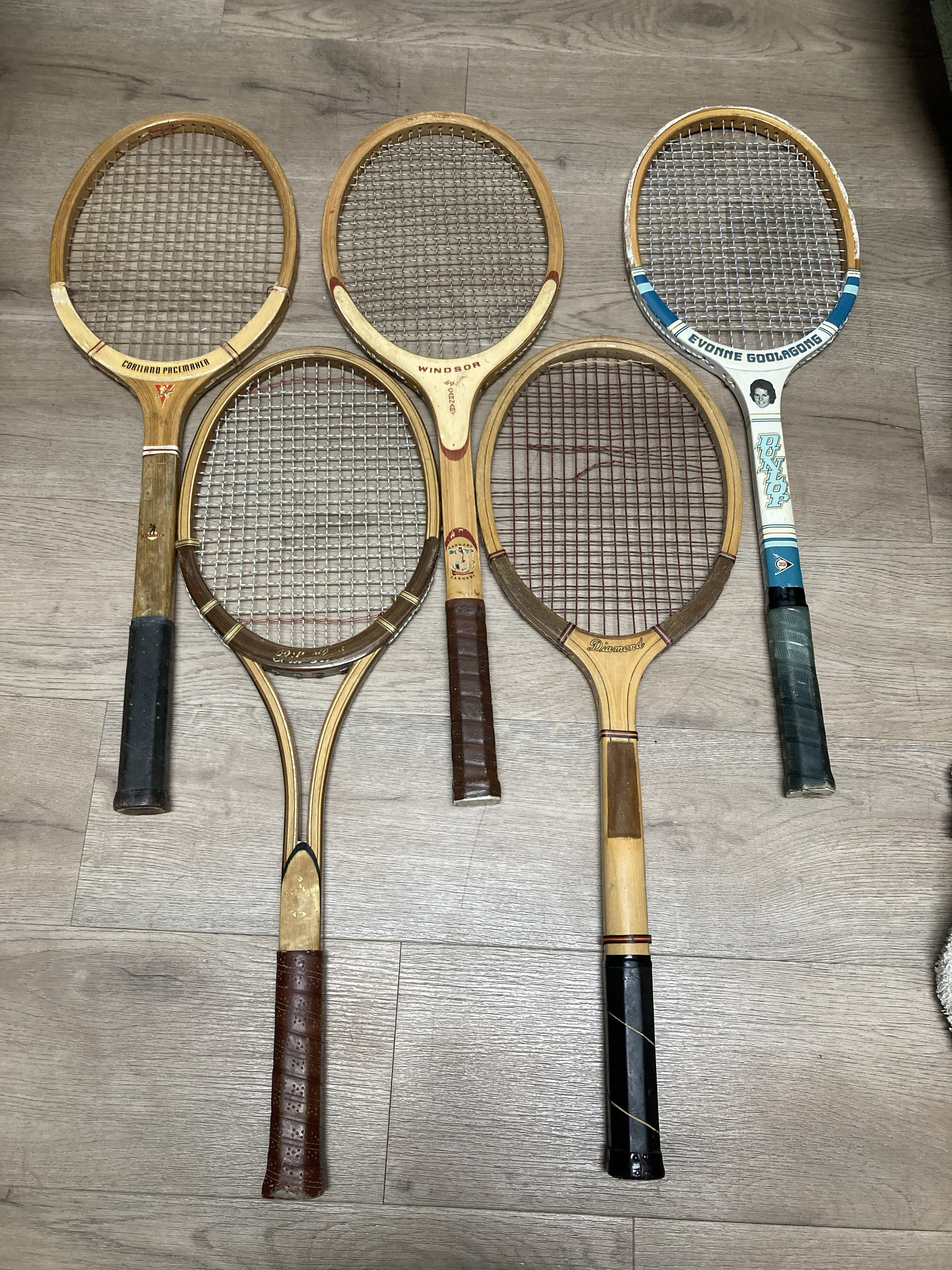 Vintage wood tennis rackets for sale — group inventory shot of 5 pieces