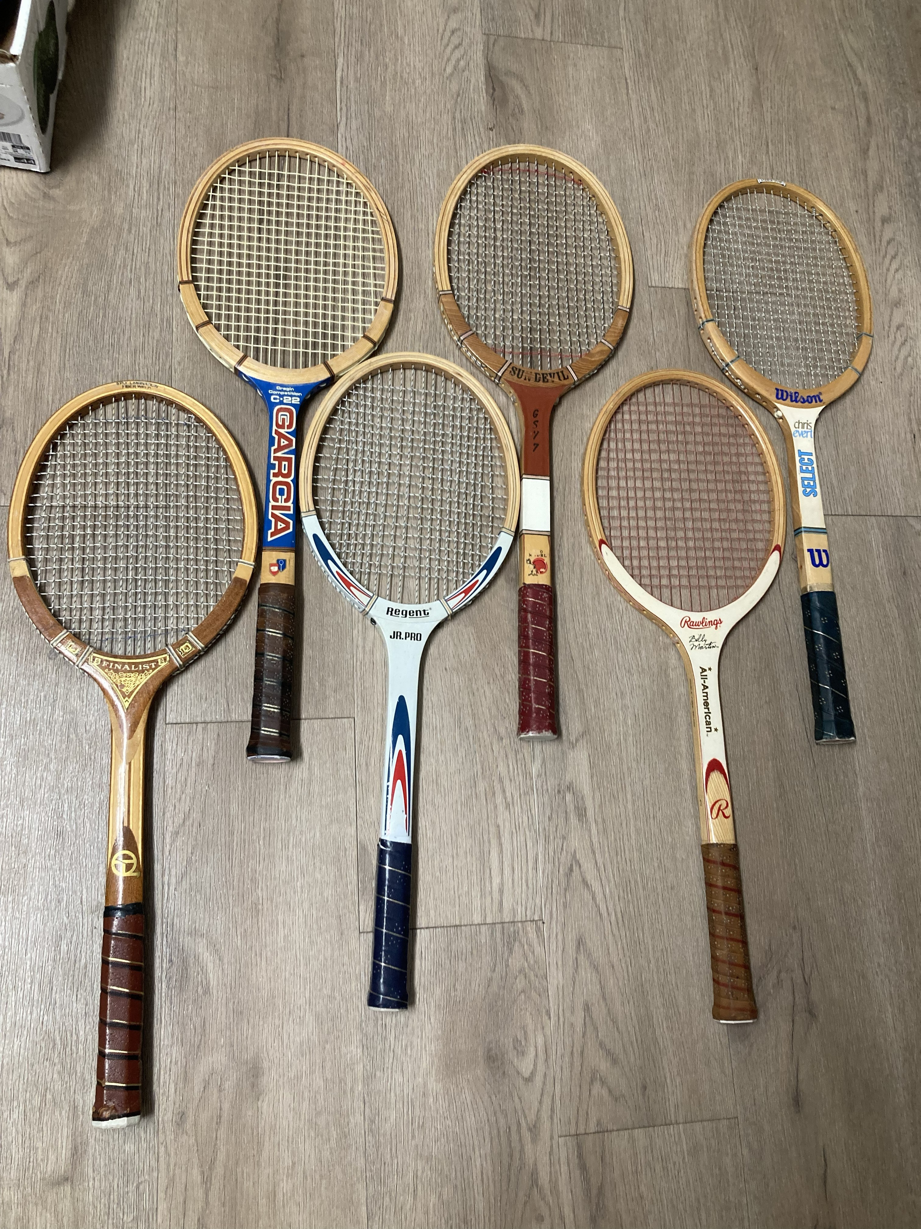 Vintage wood tennis rackets for sale — group inventory shot of 6 pieces