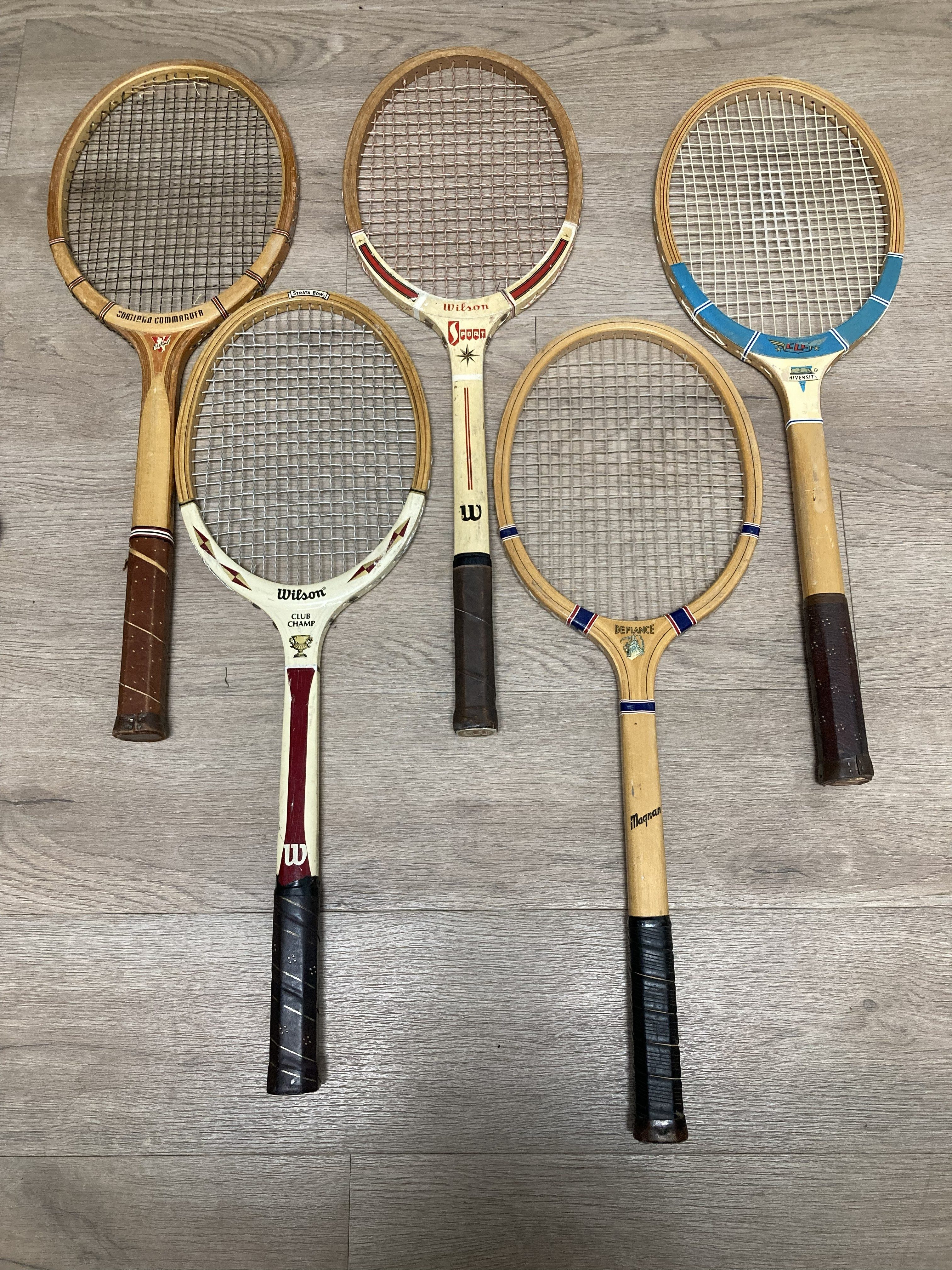 Vintage wood tennis rackets for sale — group inventory shot of 5 mixed pieces